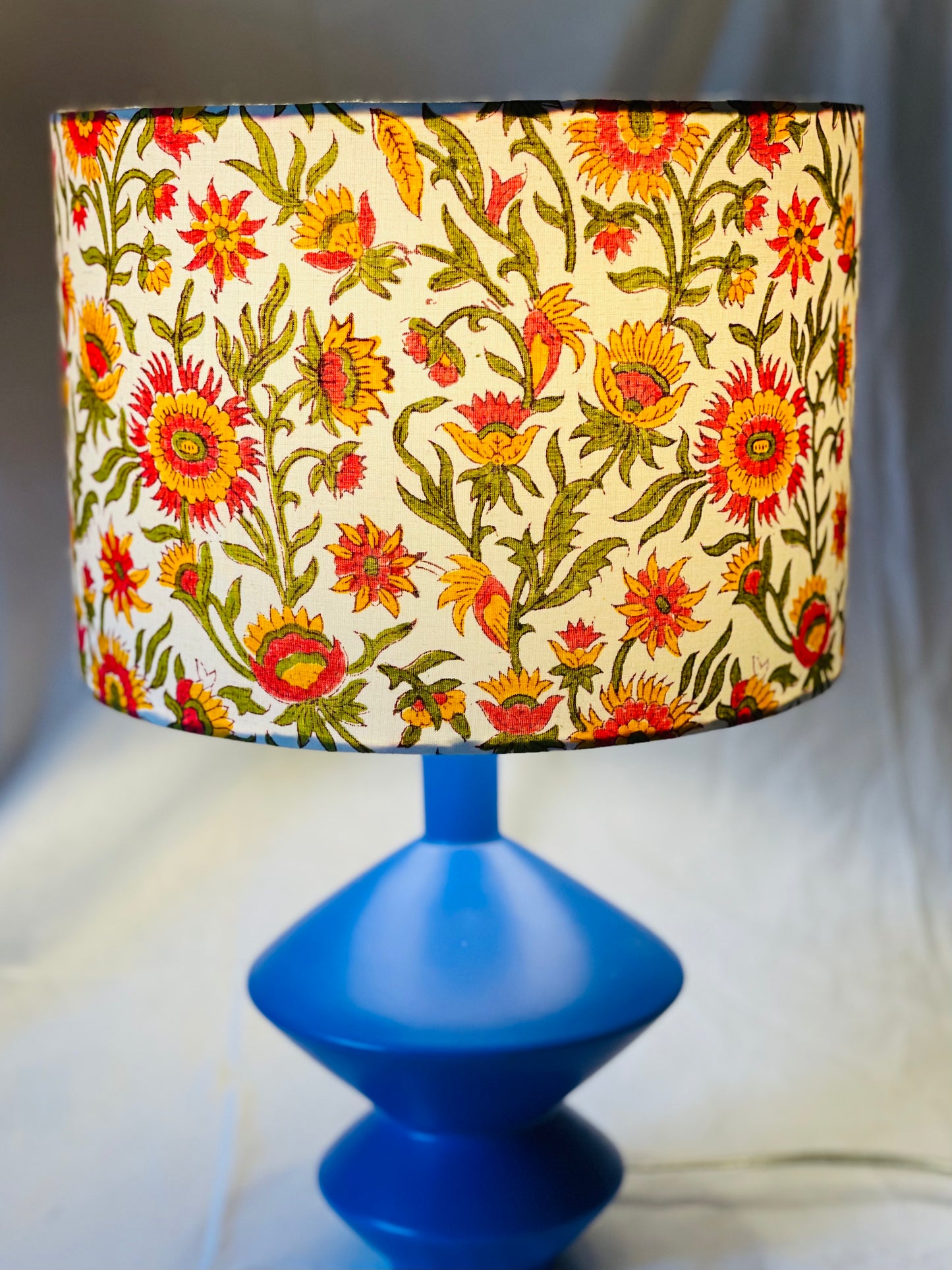 10 inch Drum Lampshade. Indian Block print from Jaipur. Candy Apple Red, Chrome Yellow, and Bright Olive Floral Motif.