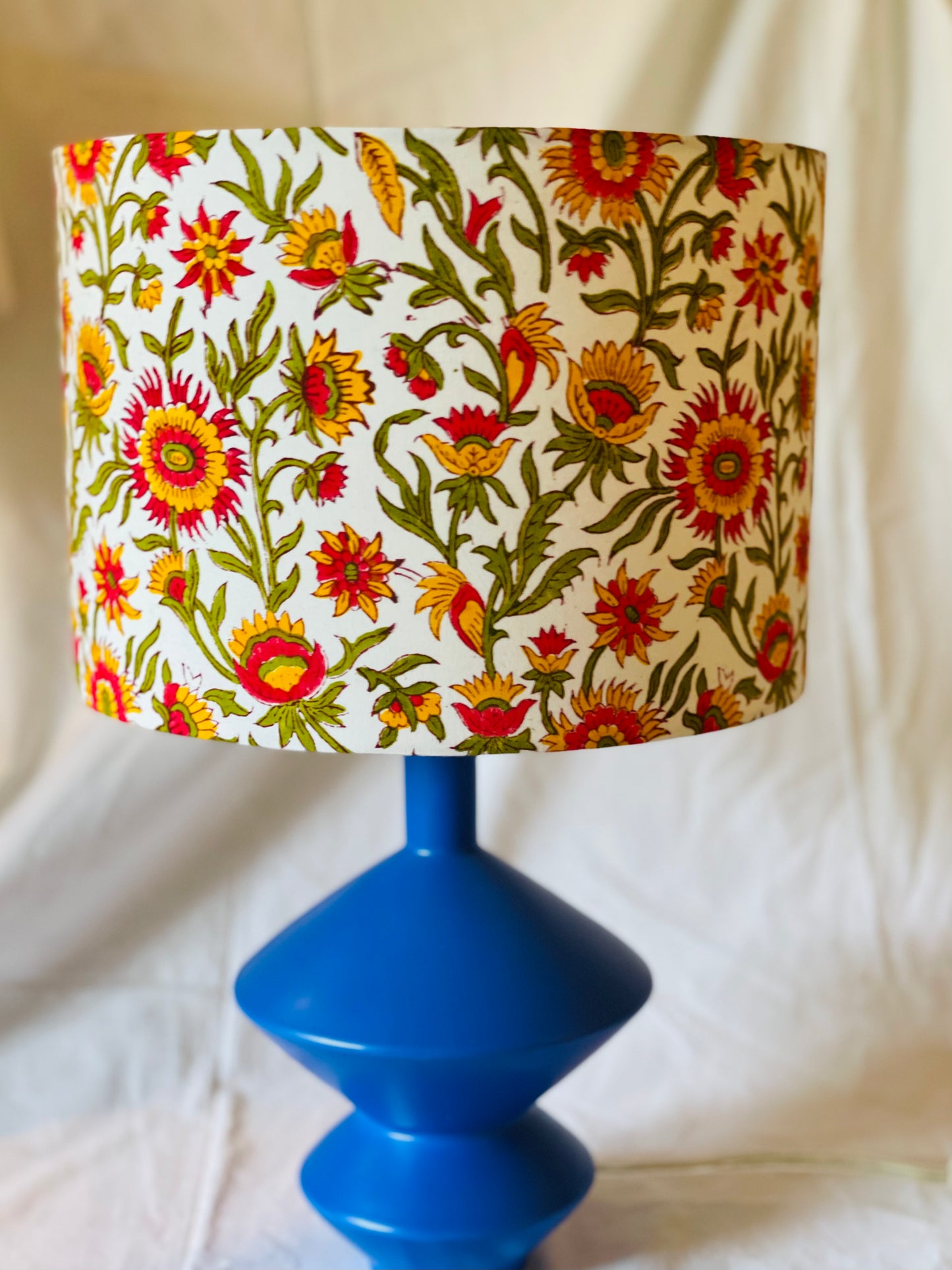 10 inch Drum Lampshade. Indian Block print from Jaipur. Candy Apple Red, Chrome Yellow, and Bright Olive Floral Motif.