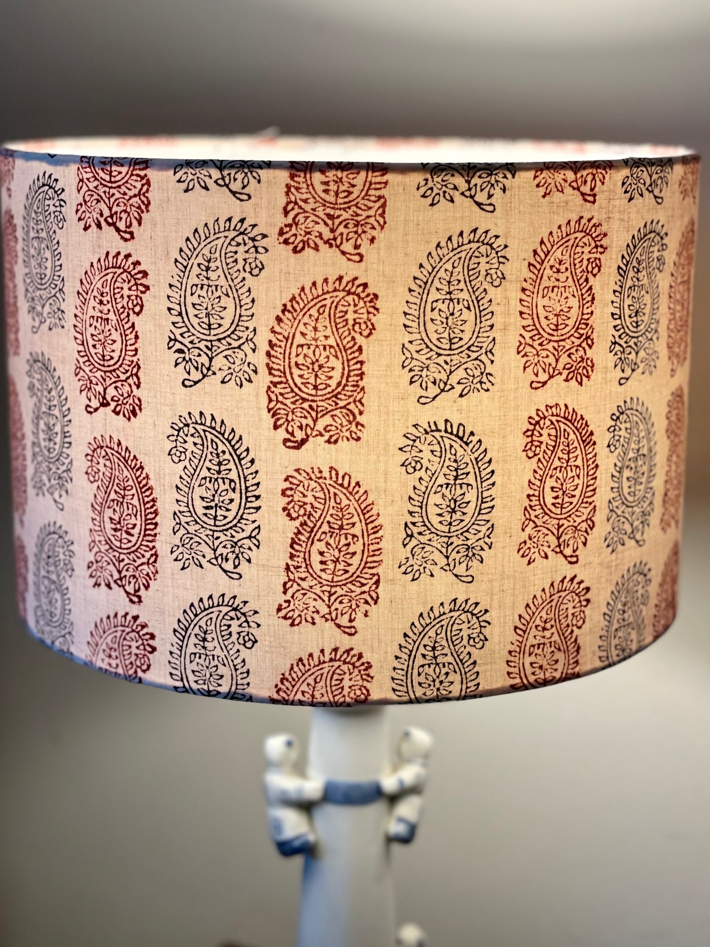12 inch Drum Lampshade. Bagh Indian Hand Block. Bagh Indian Hand Block. Ecru with Maroon and Black Fancy Paisley Motif.