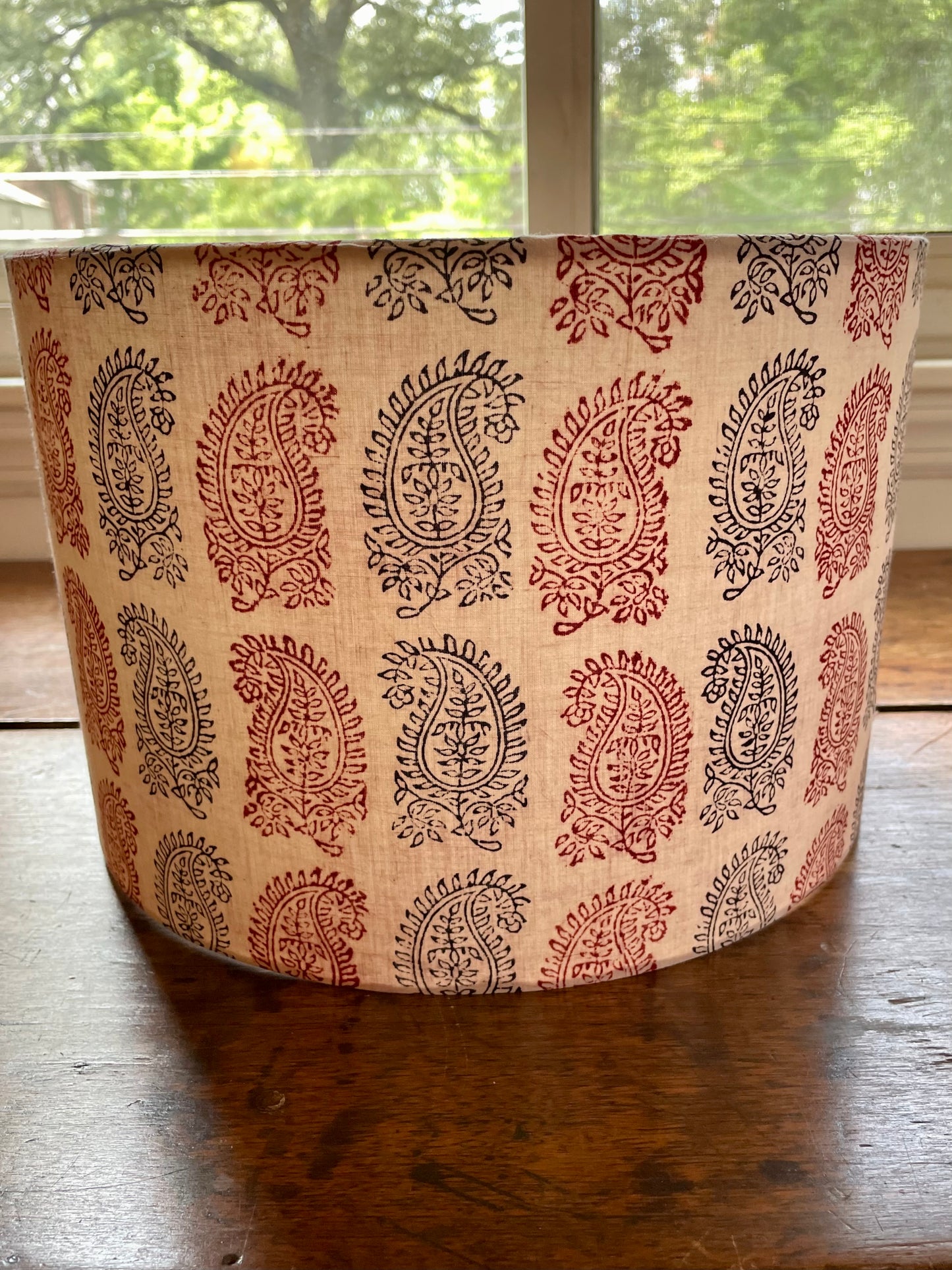12 inch Drum Lampshade. Bagh Indian Hand Block. Bagh Indian Hand Block. Ecru with Maroon and Black Fancy Paisley Motif.