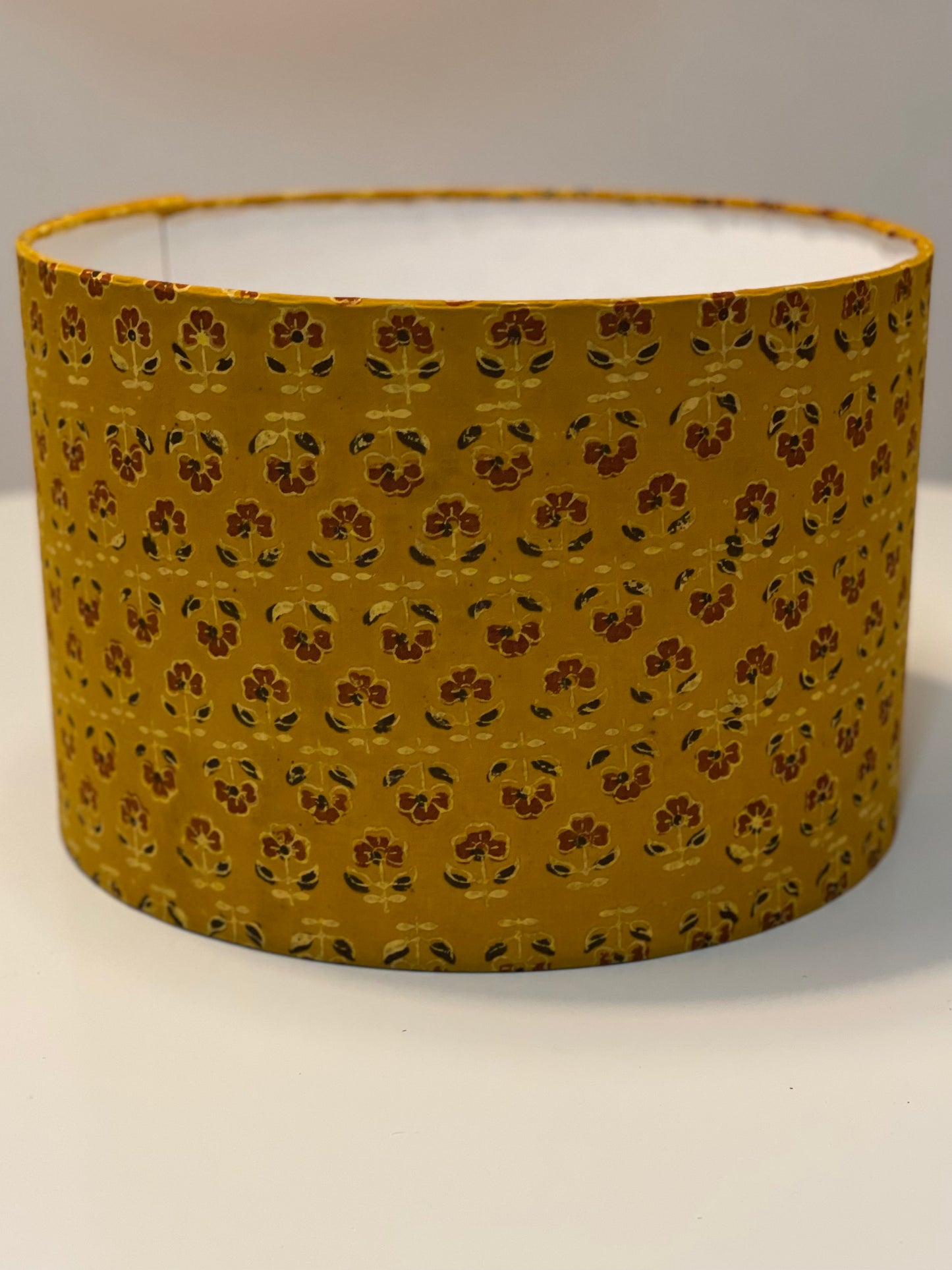 12 Inch Drum Lampshade. Turmeric Dyed Ajrak Hand Block Print. Turmeric with Saddle Brown and Black Floral Motif.