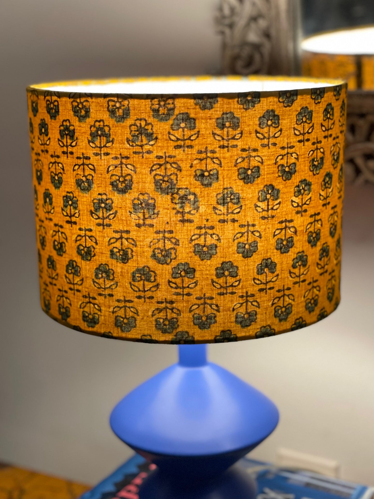 10 inch Drum Lampshade. Turmeric Dyed Ajrak Hand Block Print. Turmeric with Greyish-Blue and Dark Grey Floral Motif.