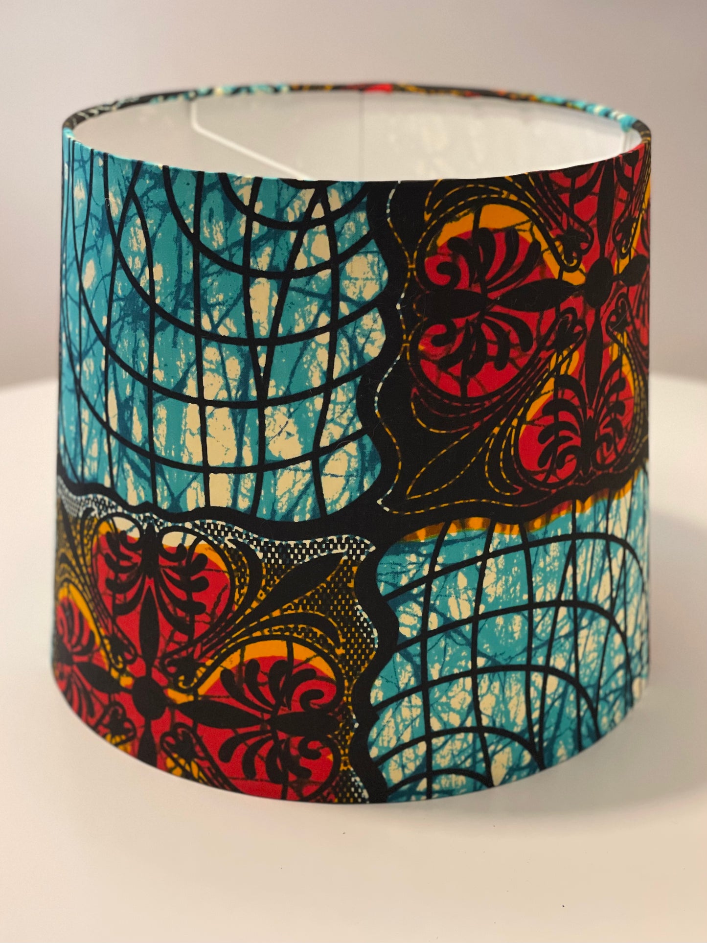 Large Empire Shade. 11.75 x 13.75 x 11.75. West African Ankara Fabric. Turquoise, Flame Orange, Licorice.