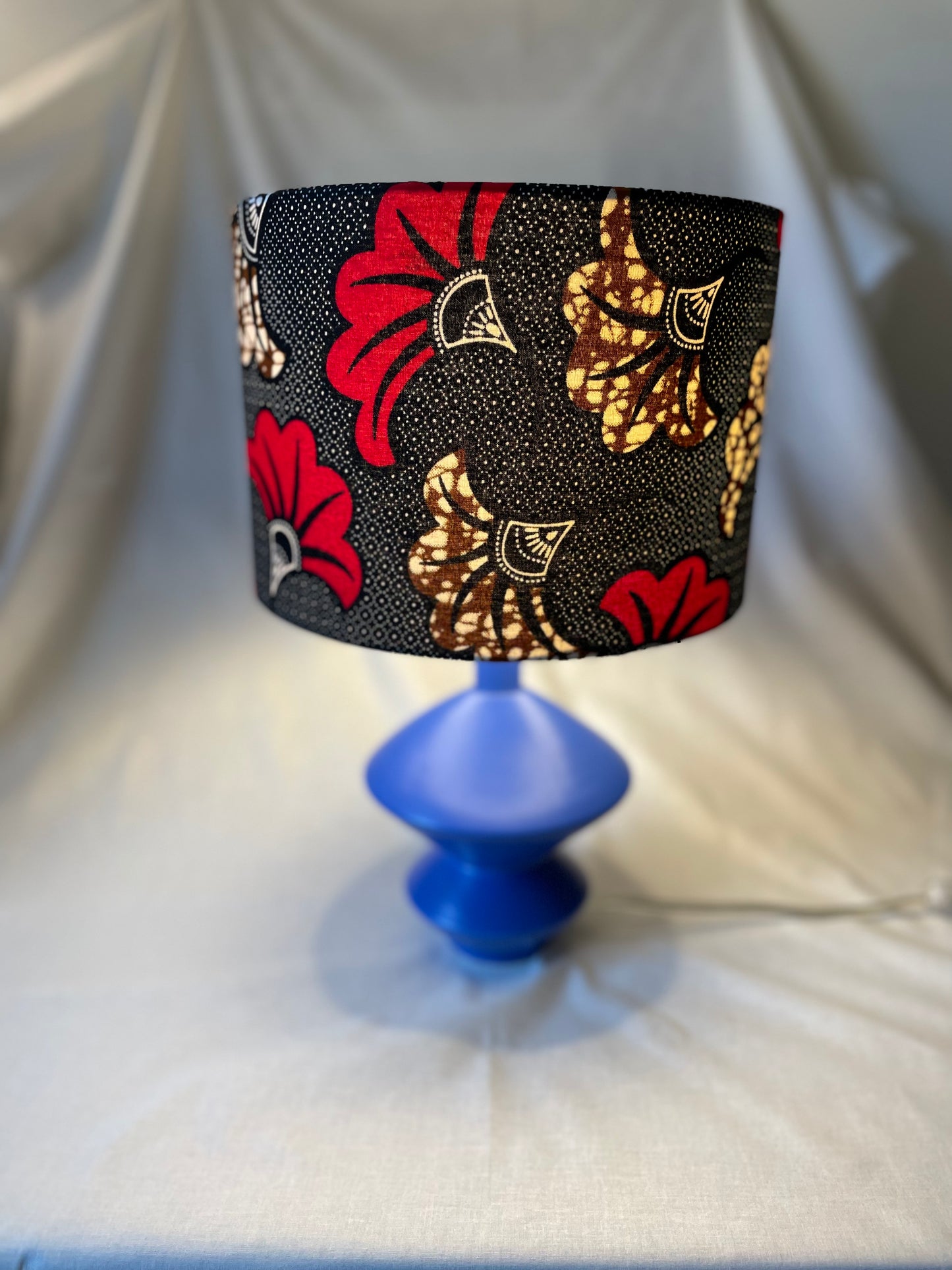 10 inch Drum Lampshade. Vibrant Black, Red and Brown Ankara "Fleur de Mariage" Print from West Africa.