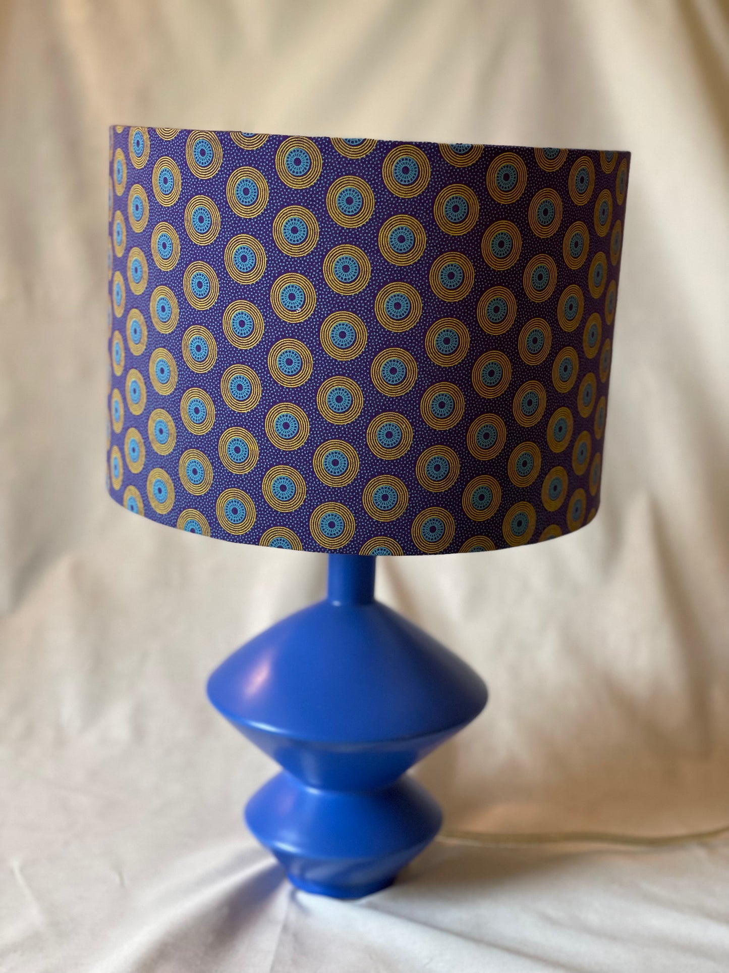 10 inch Drum Lampshade. Dynamic South African Shwe Shwe Print- Purple with Teal and Yellow "LP" Motif
