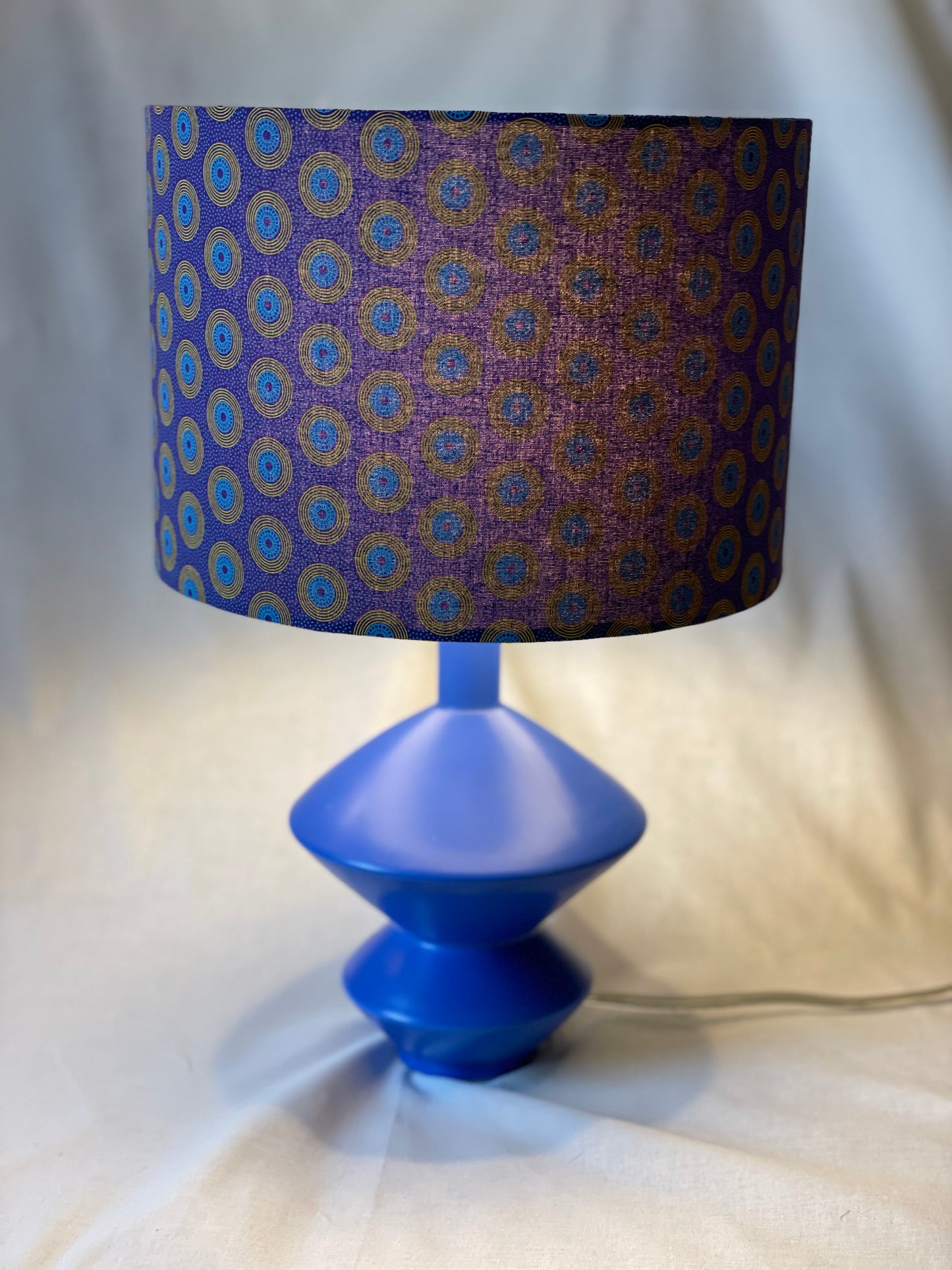 10 inch Drum Lampshade. Dynamic South African Shwe Shwe Print- Purple with Teal and Yellow "LP" Motif