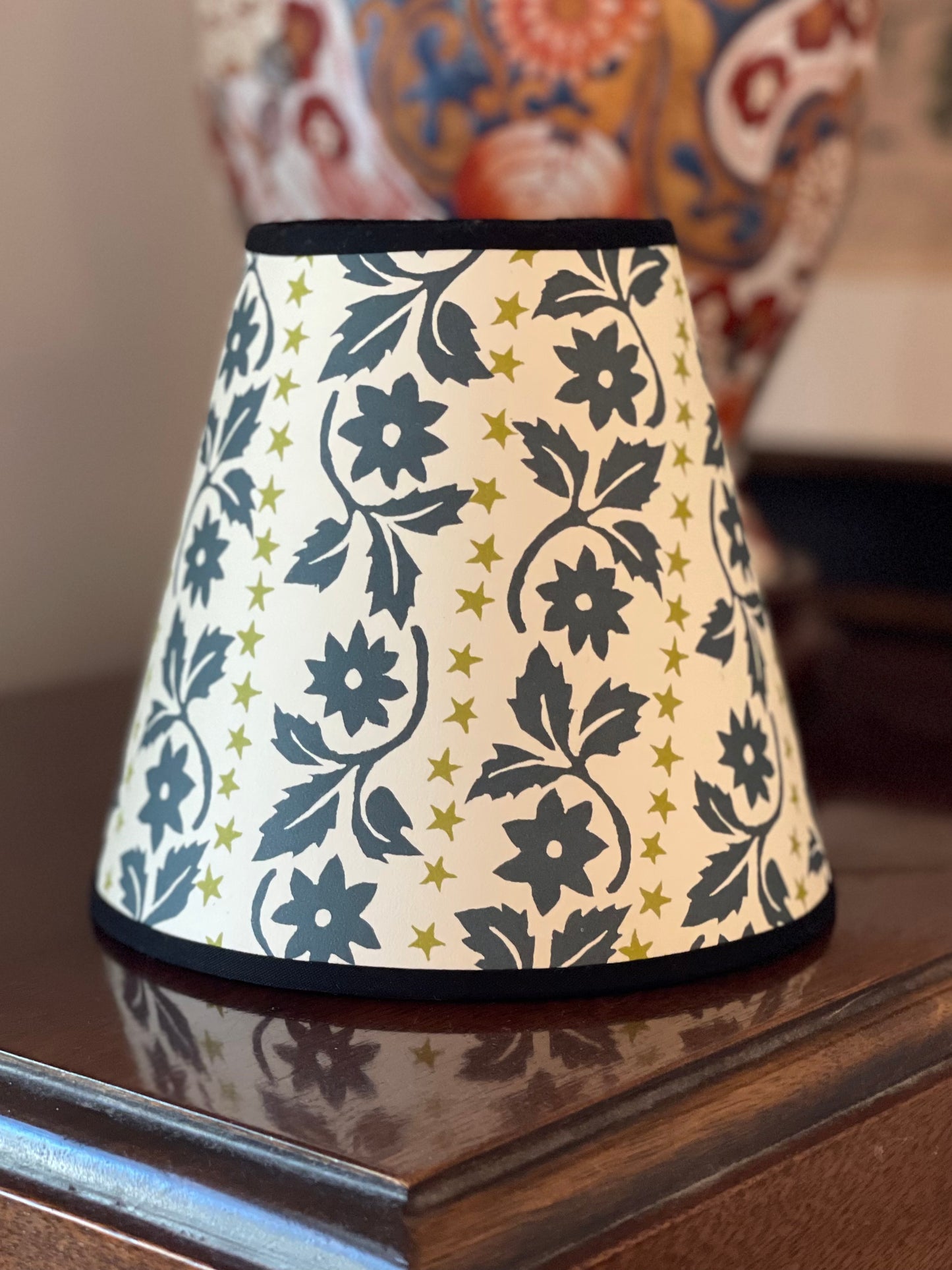 Small Clip-On Lampshade. Patterned Paper from England. "Leaves and Stars" Black Forest and Sap. Black Trim.