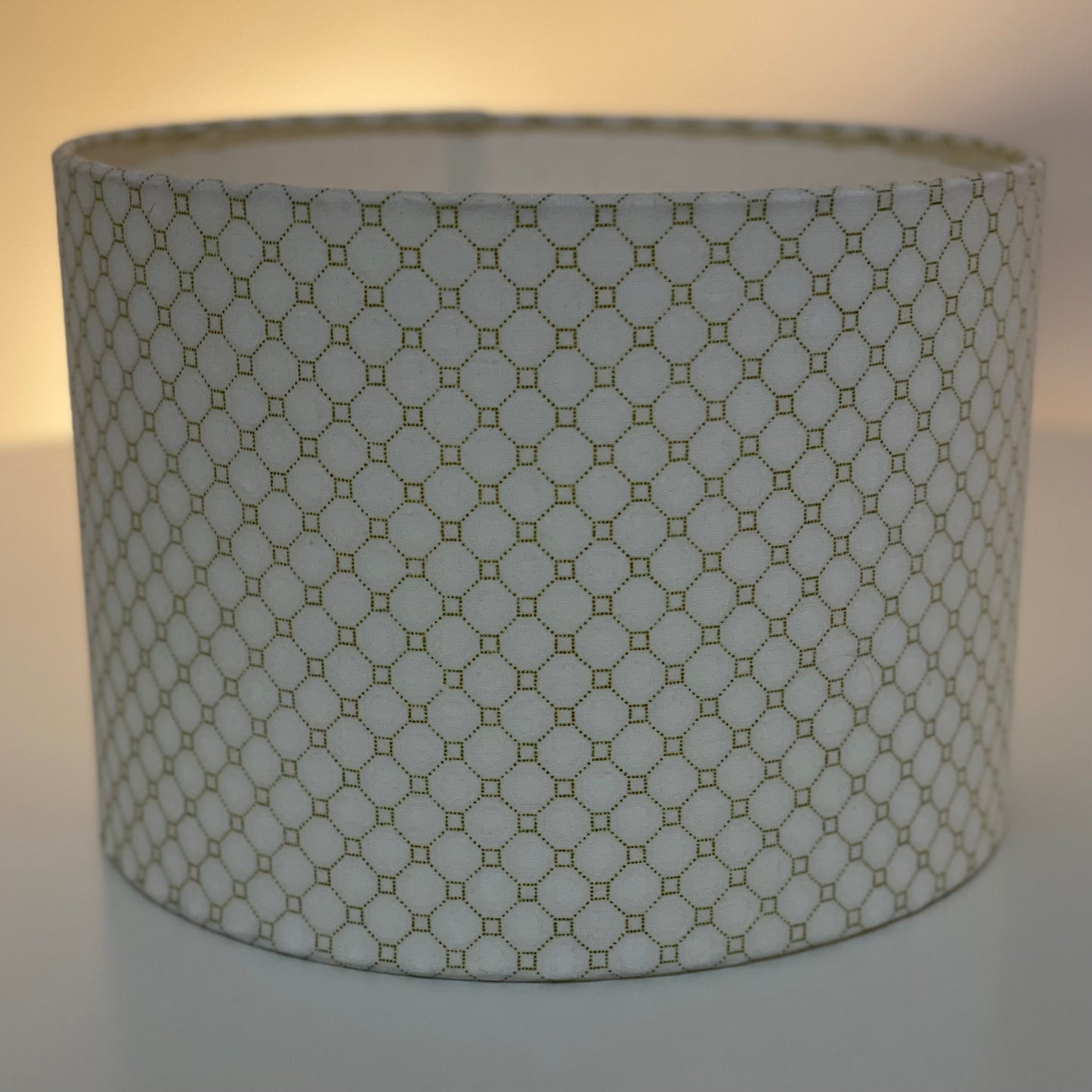 10 inch Drum Lampshade. Lovely South African Shwe Shwe Fabric- White and Gold Geometric Pattern.