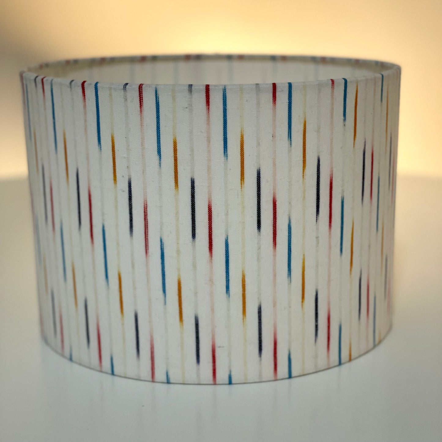 10 inch Drum Lampshade. Indian Pochampally Ikat Weave Cotton Fabric. Multicolor with White.