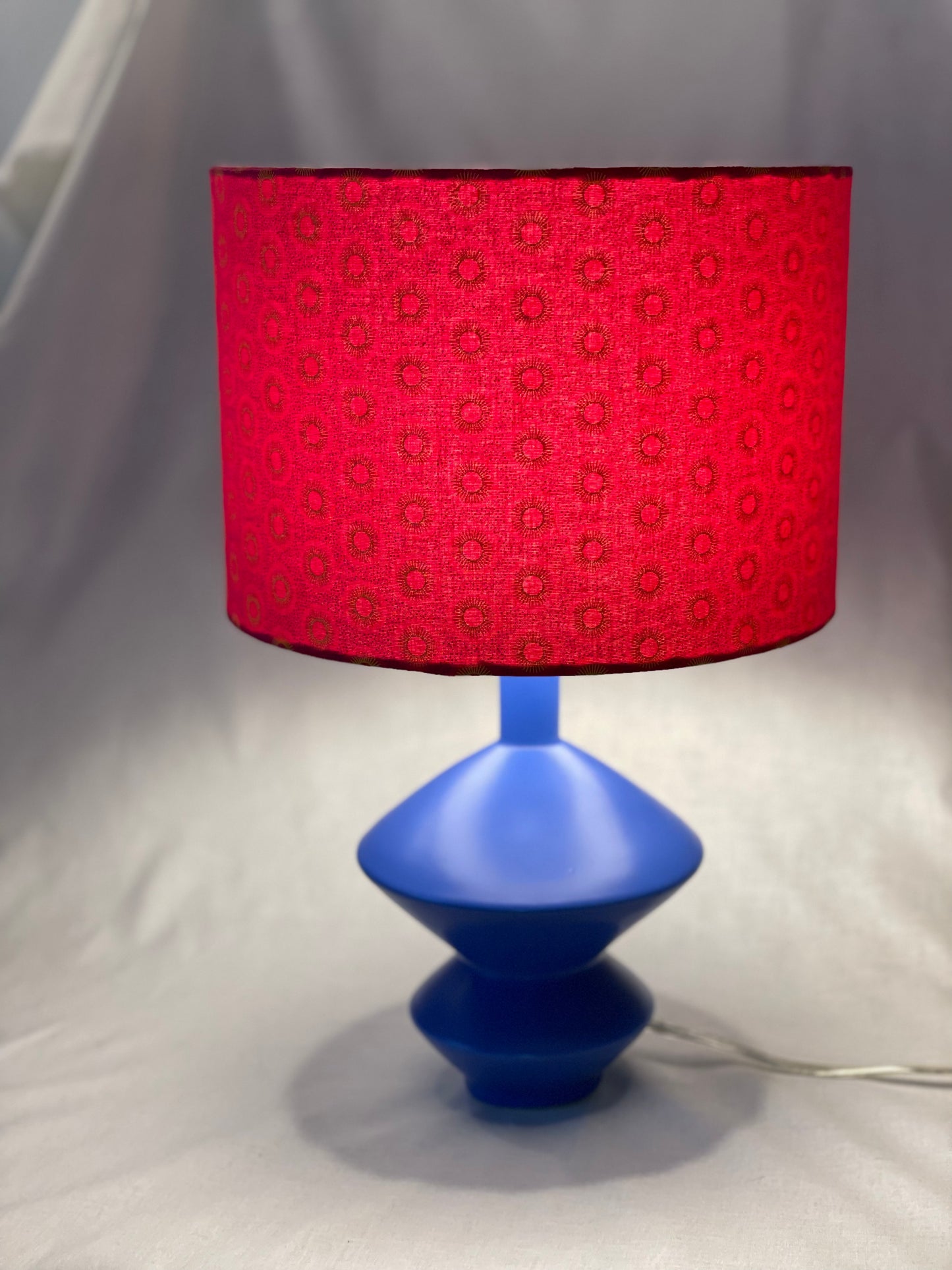 10 inch Drum Lampshade. Dynamic South African Shwe Shwe Print- Hot Pink with Golden Yellow Sun Motif.